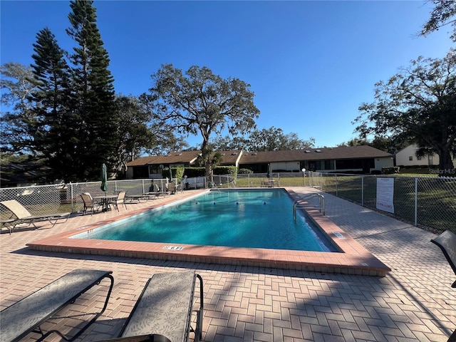 view of pool with a patio area