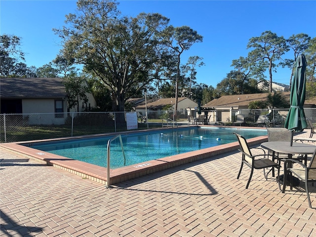 view of pool featuring a patio area