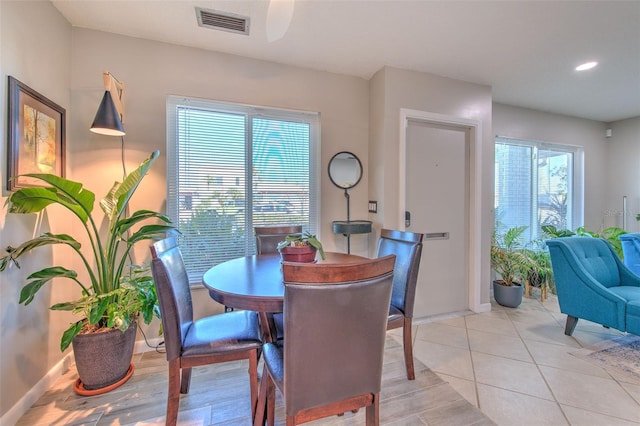 dining room featuring recessed lighting, visible vents, baseboards, and light tile patterned floors