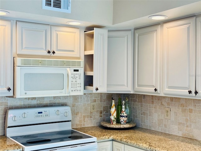 kitchen featuring white appliances, visible vents, white cabinets, open shelves, and tasteful backsplash