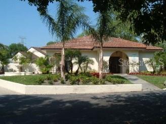 mediterranean / spanish home featuring a tiled roof