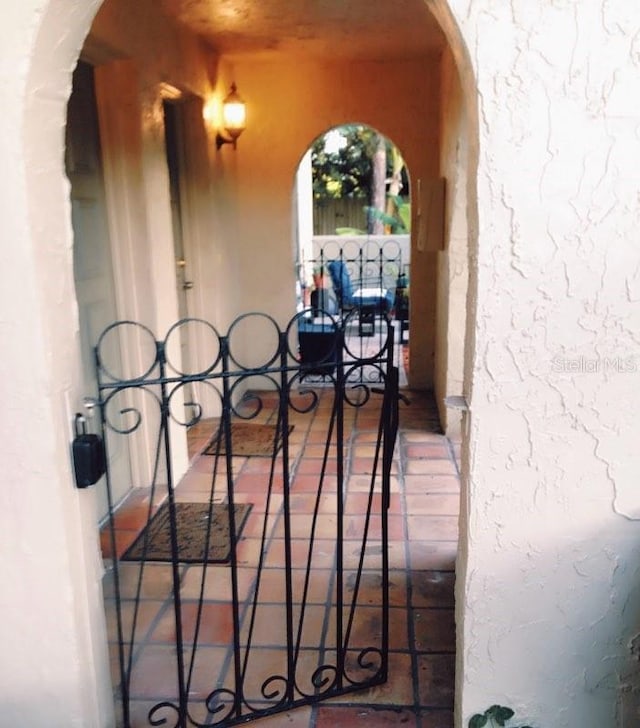 doorway to property with stucco siding