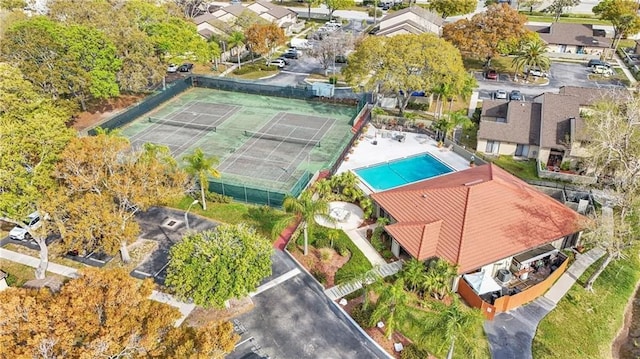 birds eye view of property with a residential view