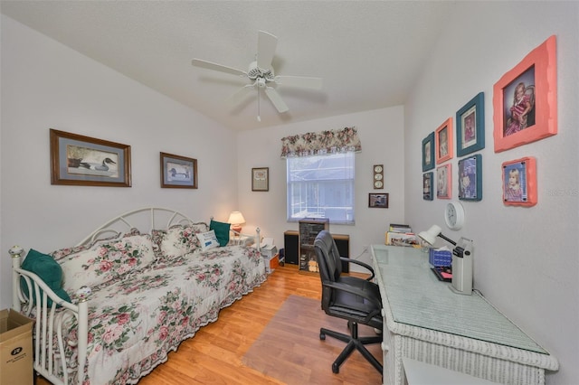 office area featuring hardwood / wood-style floors, a textured ceiling, and ceiling fan