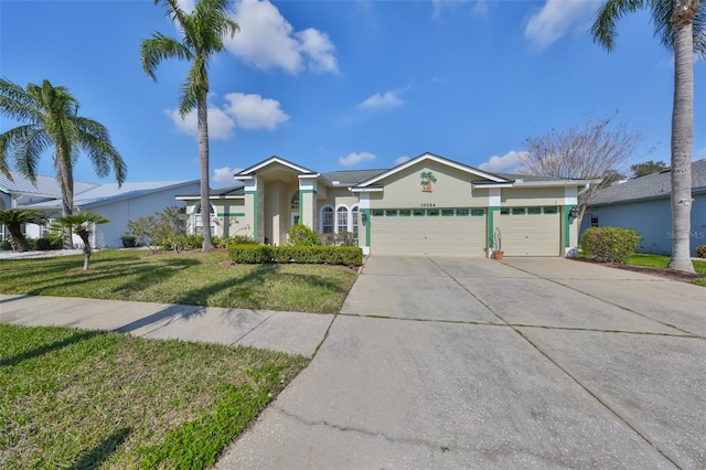 ranch-style house with a garage and a front yard