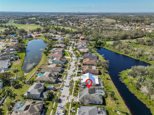 drone / aerial view with a water view