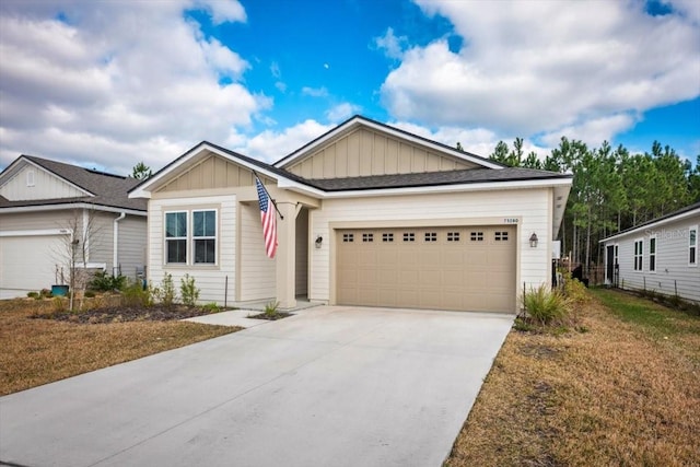 view of front of house featuring a garage and a front yard