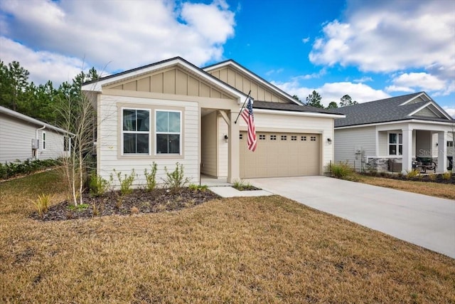 craftsman-style house with a garage and a front lawn