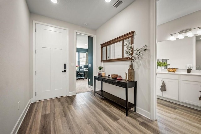 entrance foyer featuring light hardwood / wood-style flooring