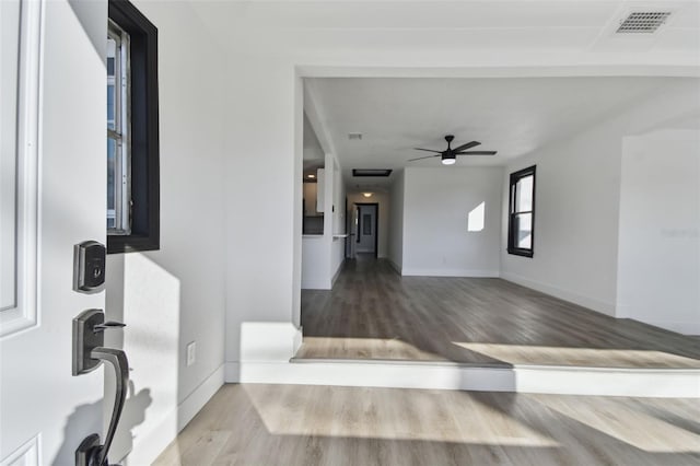 entrance foyer with ceiling fan and hardwood / wood-style floors