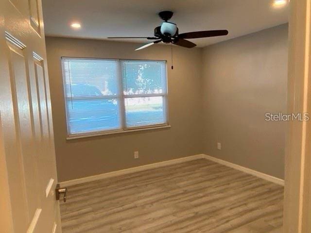 1829 10th St N, Saint Petersburg, FL 33704 - empty room with light hardwood / wood-style flooring and ceiling fan