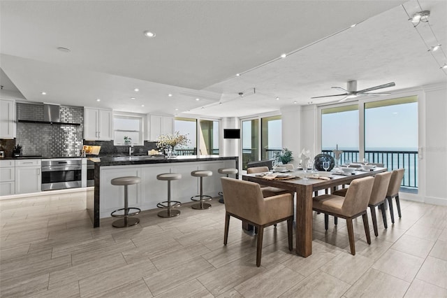 dining room with ceiling fan