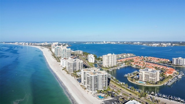 bird's eye view with a view of the beach and a water view