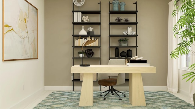 office space with tile patterned floors