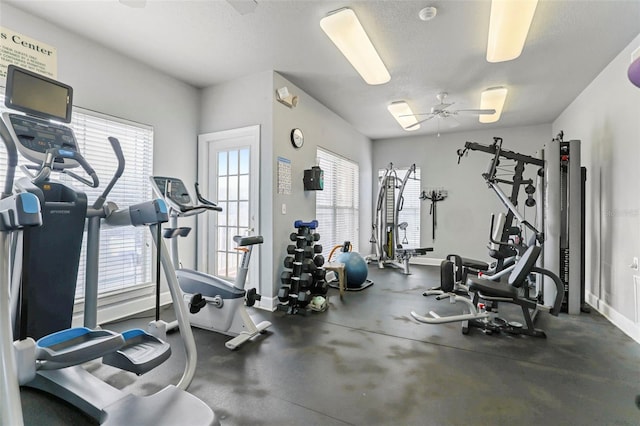 gym with a textured ceiling