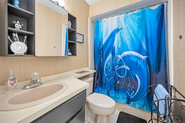 bathroom with vanity, walk in shower, and toilet