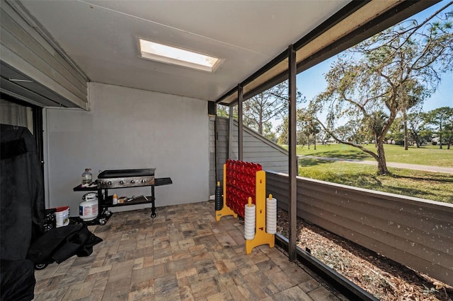 sunroom / solarium with a skylight