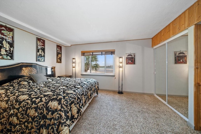 bedroom with carpet floors and a closet