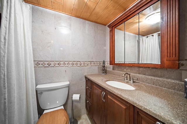 bathroom with tile walls, vanity, wood ceiling, and toilet