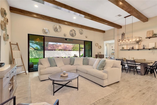 living area featuring beam ceiling, visible vents, recessed lighting, and light wood-type flooring