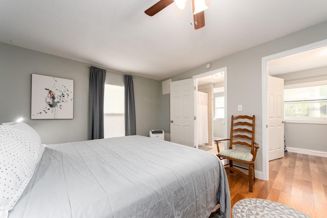 bedroom featuring ceiling fan and light hardwood / wood-style flooring