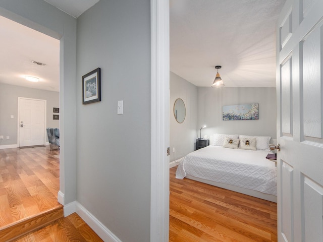 bedroom featuring light hardwood / wood-style flooring