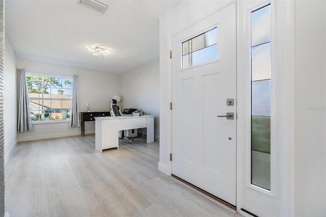 foyer featuring light hardwood / wood-style flooring