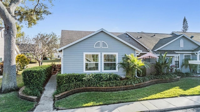 view of home's exterior with a lawn