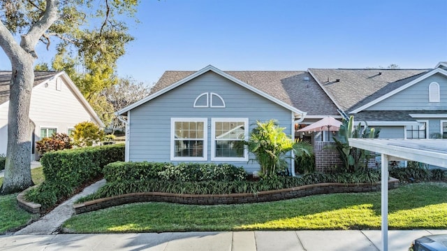 view of front of home with a front yard