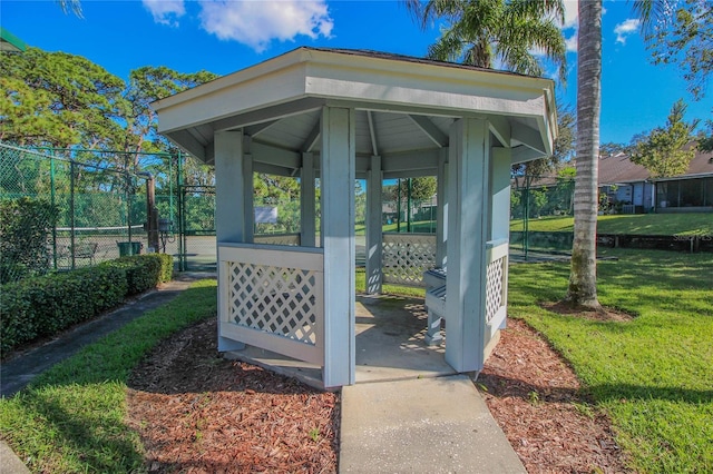 view of community featuring a gazebo and a lawn