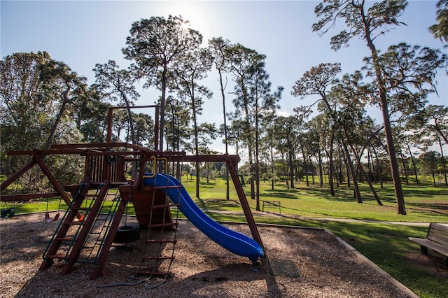 view of play area featuring a lawn