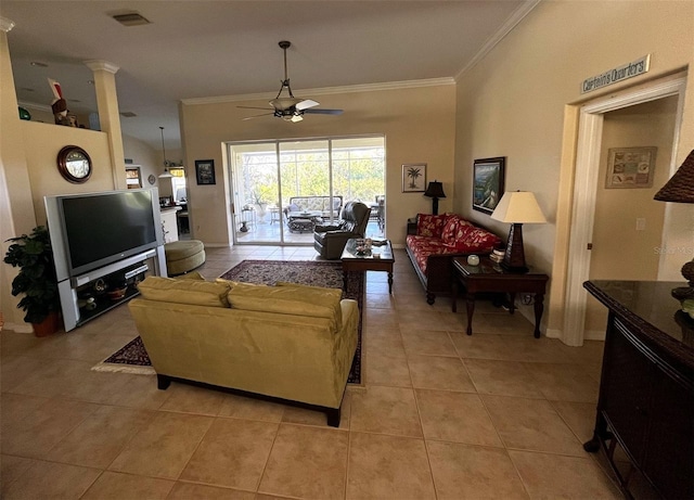 living room with ornate columns, ornamental molding, light tile patterned floors, and ceiling fan