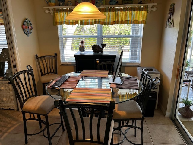 view of tiled dining space