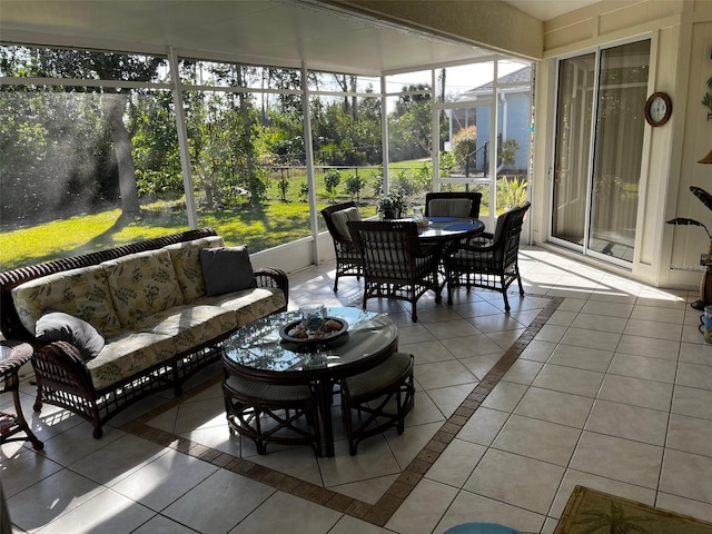 sunroom / solarium featuring plenty of natural light