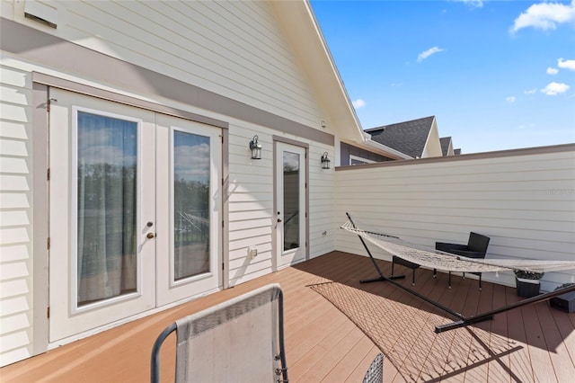 wooden terrace featuring french doors