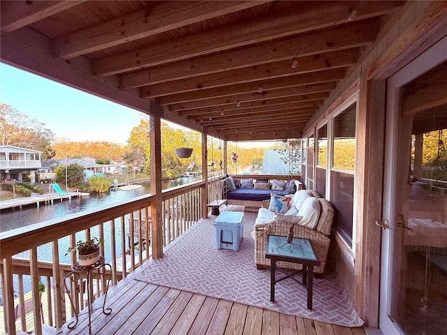 deck featuring a water view