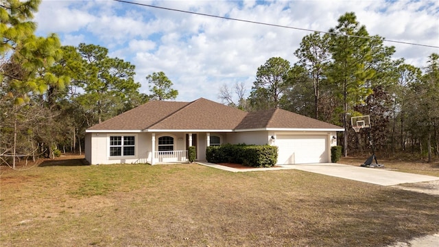 single story home with a garage, covered porch, and a front lawn