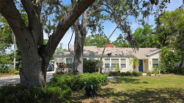 1372 Palmetto St, Clearwater, FL 33755 - view of front of property with a front yard