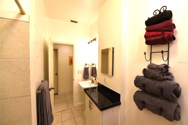 1372 Palmetto St, Clearwater, FL 33755 - bathroom with tile patterned floors, visible vents, and vanity