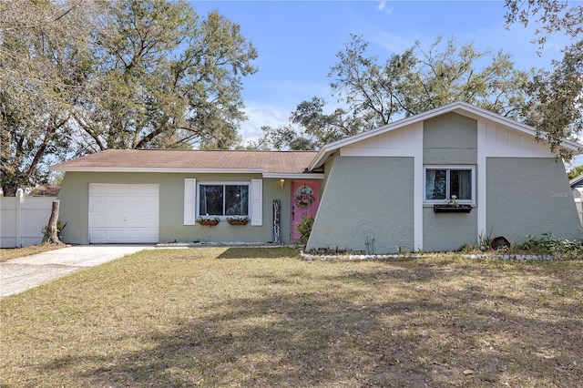 ranch-style house with a garage and a front yard