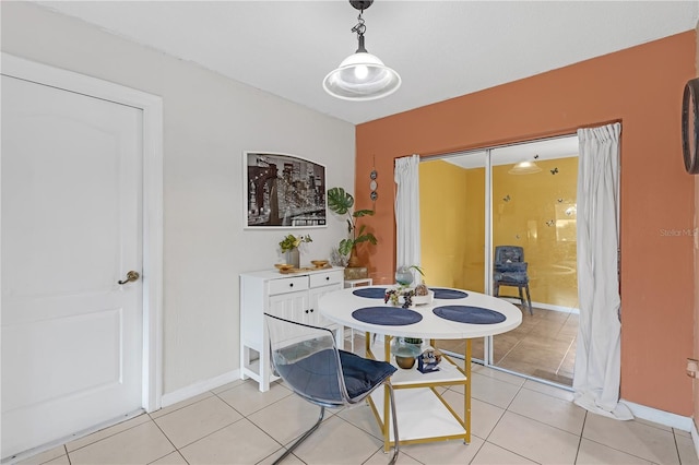 dining space with light tile patterned floors