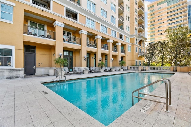 community pool with a patio