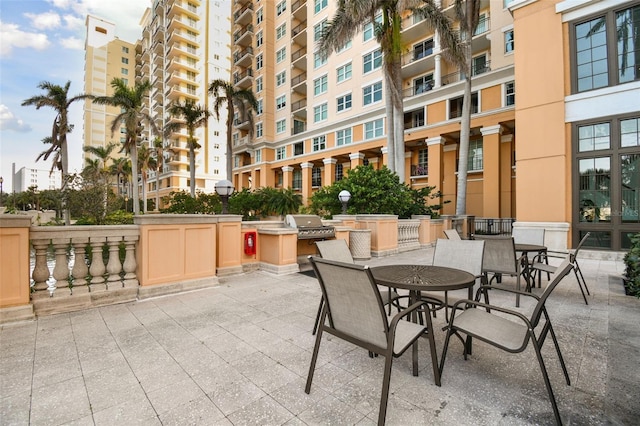 view of patio with exterior kitchen and grilling area