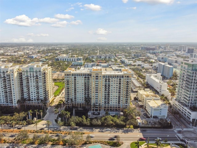 birds eye view of property featuring a city view