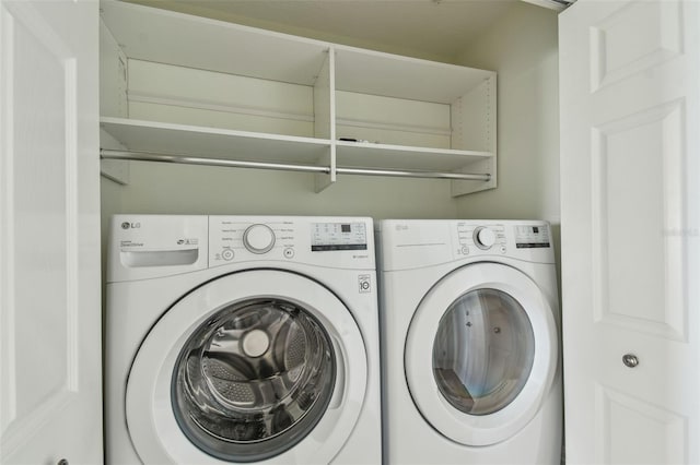 laundry area featuring laundry area and washer and dryer