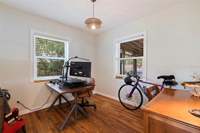 office with wood finished floors and baseboards