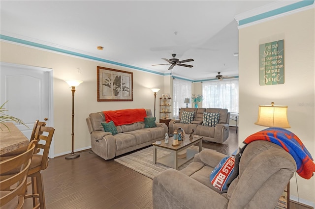 living room featuring dark hardwood / wood-style flooring and crown molding