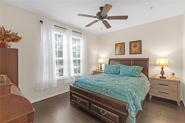 bedroom with ceiling fan and dark hardwood / wood-style flooring