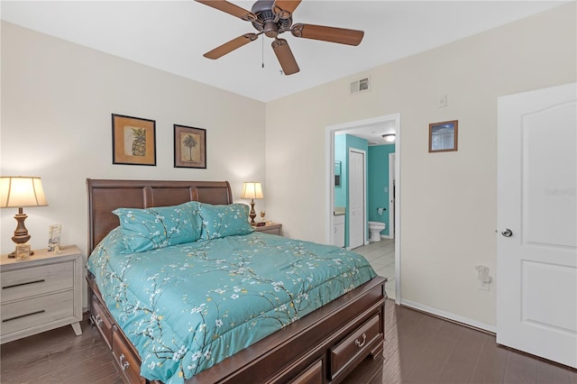 bedroom featuring dark wood-type flooring, connected bathroom, and ceiling fan