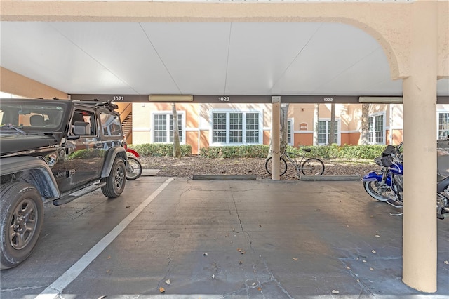 garage featuring a carport